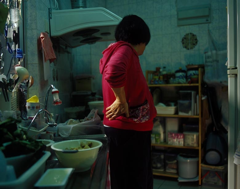 Mandy in her kitchen in the now demolished Lower Kai Yuen Lane, North Point.